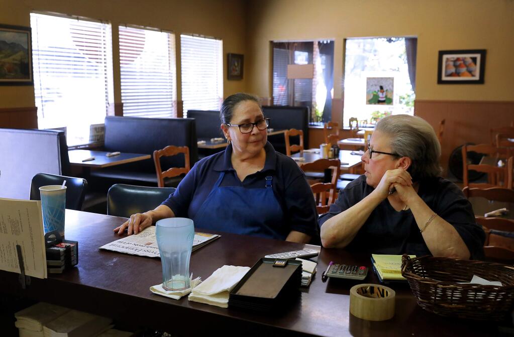 Singletree Cafe co-owners Dolores Rodriguez, left, and Nanci Van Praag say they have seen a significant decrease in business due to the road construction along Healdsburg Avenue. (Christopher Chung / The Press Democrat)