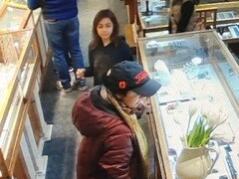 Video footage from the Sonoma jewelry store Halem and Co. de Sonoma shows a pair of suspects, the adult woman in red and the juvenile female, taking approximately 40 gold rings from the store. (Photo courtesy of Allyson Fielder)