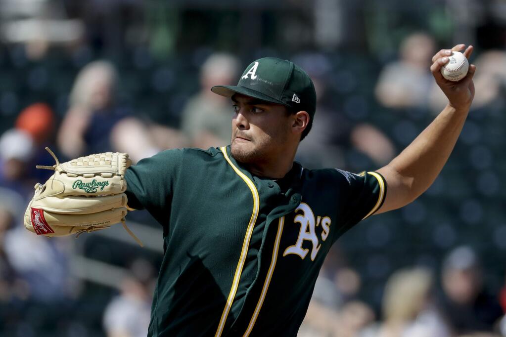 Oakland Athletics starting pitcher Sean Manaea throws against the Texas Rangers during the second inning in Mesa, Ariz., Tuesday, March 6, 2018. (AP Photo/Chris Carlson)