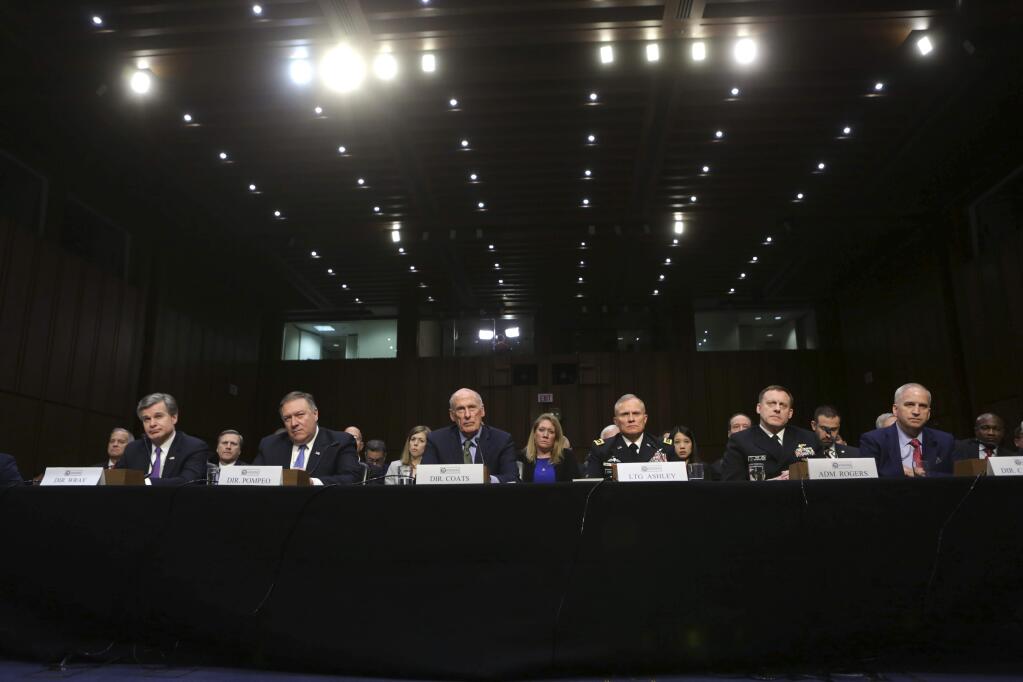 American intelligence and law enforcement officials testify Tuesday at a Senate Intelligence Committee hearing. Dan Coats, the national intelligence director, and CIA chief Mike Pompeo said they expect Russian to meddle in this year's midterm elections. (LAWRENCE JACKSON / New York Times)