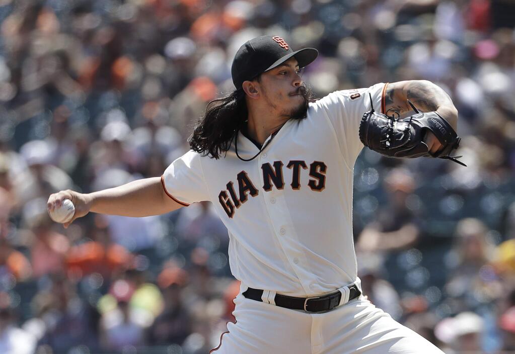 San Francisco Giants pitcher Dereck Rodriguez throws against the Pittsburgh Pirates during the first inning in San Francisco, Sunday, Aug. 12, 2018. (AP Photo/Jeff Chiu)