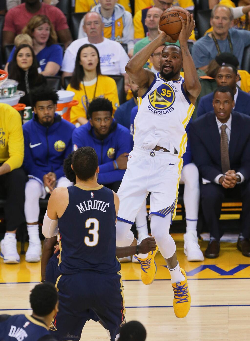 Golden State Warriors forward Kevin Durant hits a fadeaway jumper over New Orleans Pelicans forward Nikola Mirotic, during their game in Oakland on Tuesday, May 8, 2018. (Christopher Chung/ The Press Democrat)