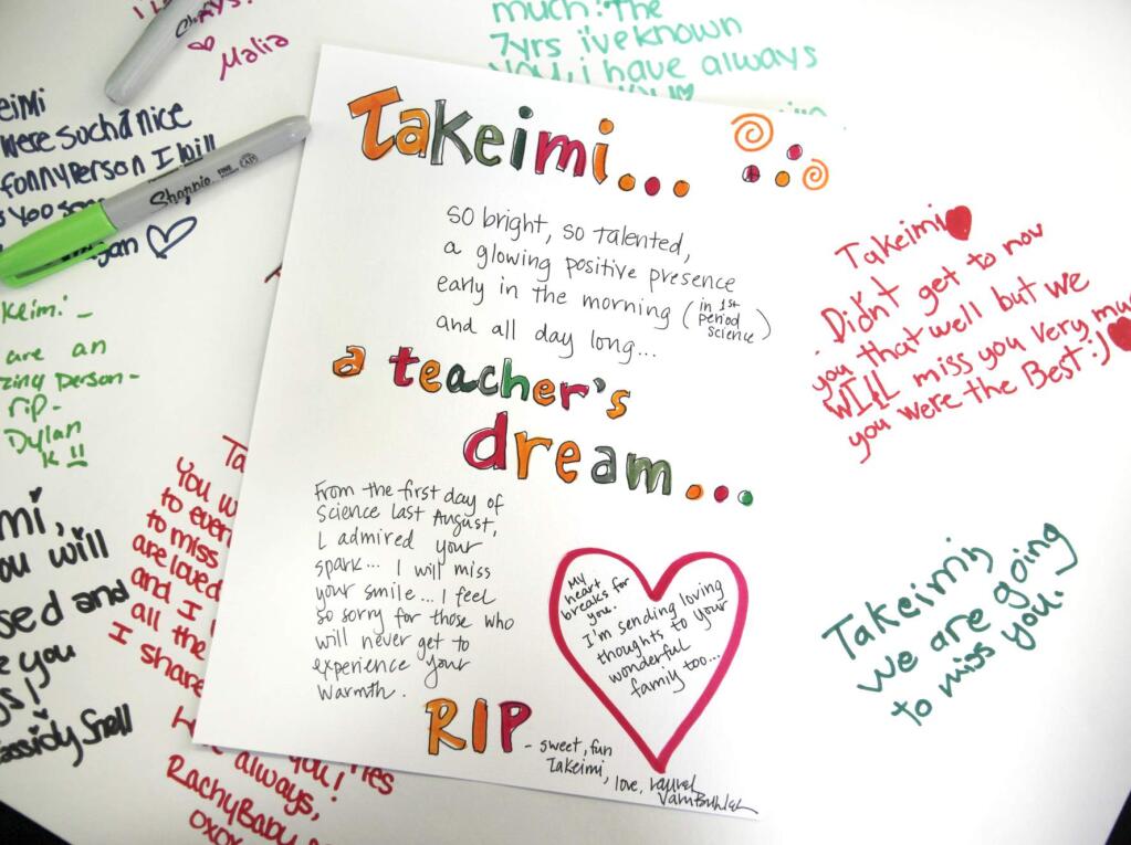 (File photo) Notes written expressing thoughts of Takeimi Rao during a memorial held at Rincon Valley Middle School, July 13, 2011.