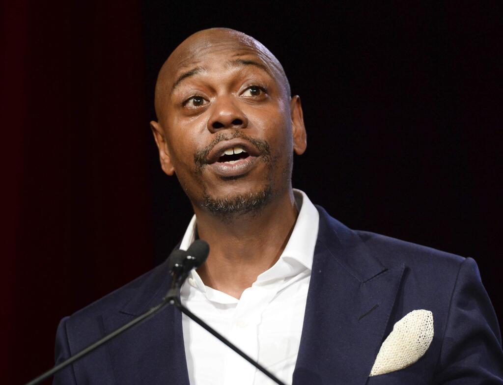 FILE - In this July 18, 2015, file photo, comedian Dave Chappelle speaks at the RUSH Philanthropic Arts Foundation's Art for Life Benefit in New York. (Photo by Scott Roth/Invision/AP, File)