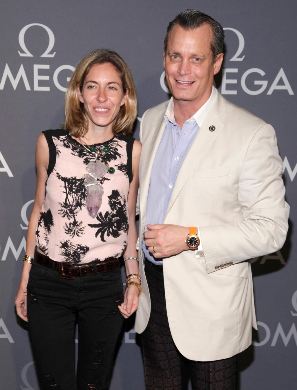 FILE- In this June 10, 2014, file photo, Nicole Mellon, left, and Matthew Mellon, right, attend the Omega Speedmaster Dark Side of the Moon launch event in New York. Billionaire banking heir Matthew Mellon has died. His cousin Peter Stephaich confirmed Mellon's death but declined Tuesday, April 17, 2018, to provide any details. He was 54. (Photo by Andy Kropa/Invision/AP, File)