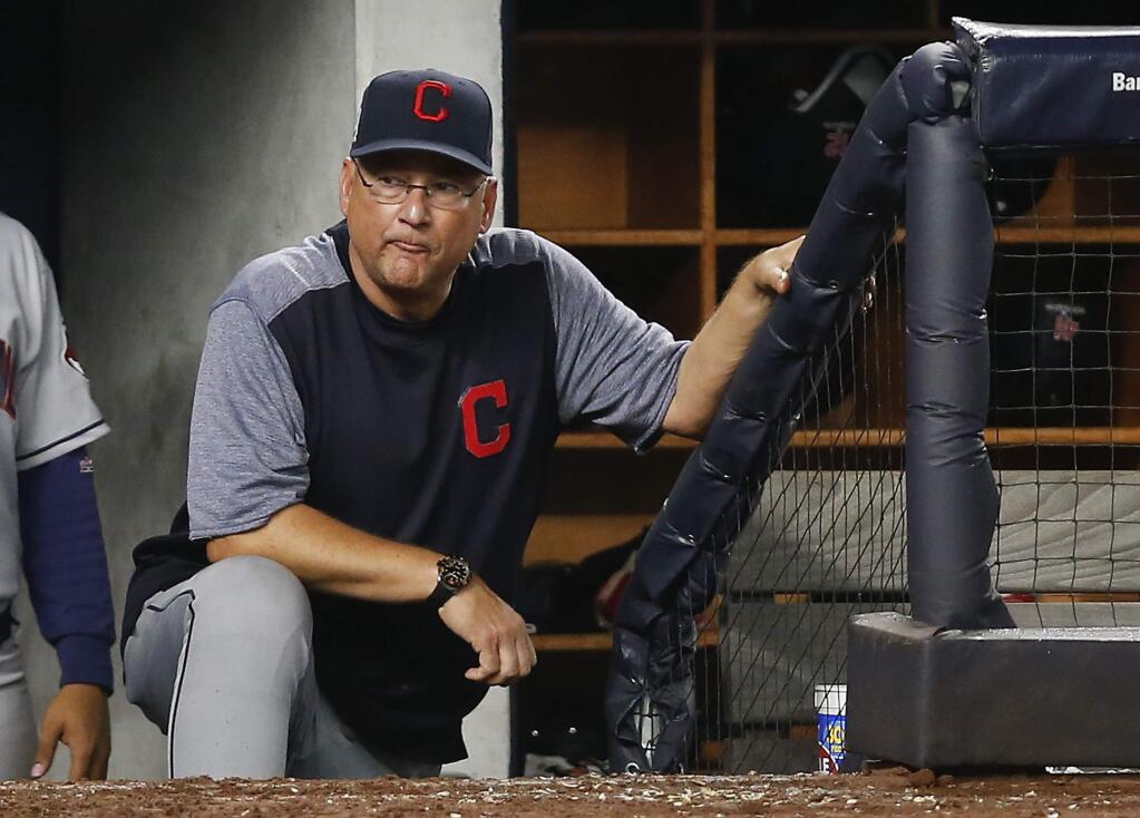 Cleveland Indians manager Terry Francona watches play against the New York Yankees from the dugout in Game 4 of baseball's American League Division Series, Monday, Oct. 9, 2017, in New York. (AP Photo/Kathy Willens)