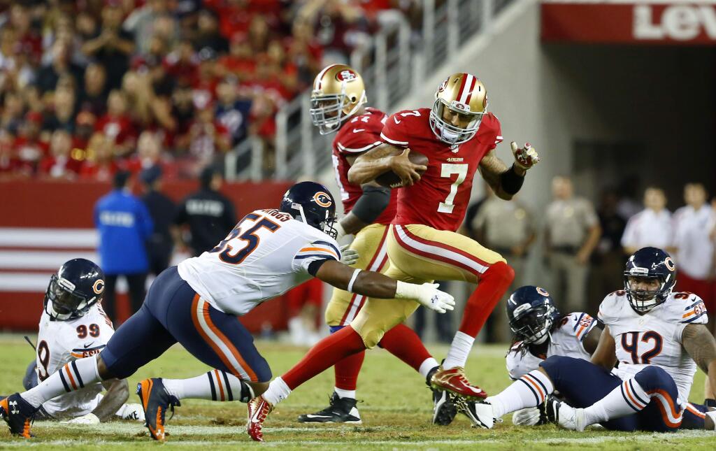 PHOTO: 1 BY CONNER JAY/ THE PRESS DEMOCRAT49ers quarterback Colin Kaepernick tries to scramble Sunday against the Chicago Bears. Kaepernick was responsible for all four of the 49ers' turnovers in the 28-20 loss.