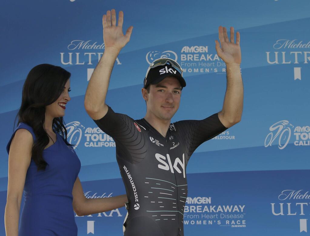 Elia Viviani, of the BMC Racing Team, waves as he is introduced during the awards ceremony after he finished third in the first stage of the Men's Tour of California cycling race, Sunday, May 14, 2017, in Sacramento, Calif. (AP Photo/Rich Pedroncelli)