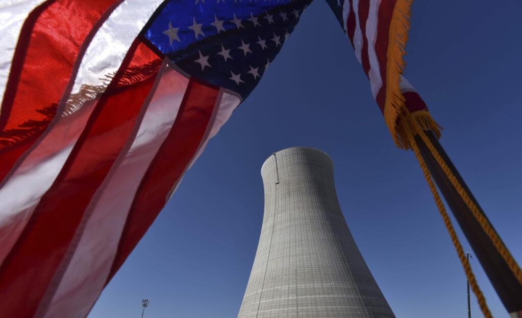 FILE - In this March 22, 2019 file photo, the construction site of Vogtle Units 4 at the Alvin W. Vogtle Electric Generating Plant is seen, Friday, March 22, 2019 in Waynesboro, Ga. The Nuclear Regulatory Commission will look at cutting back on inspections of the country's nuclear reactors. Staff recommendations made public Tuesday would reduce the time and scope of annual inspections at the nation's 90-plus nuclear power plants. Some other inspections would be cut from every two years to every three years. (Hyosub Shin/Atlanta Journal-Constitution via AP)