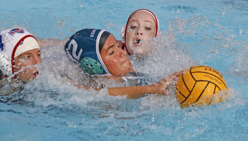 Bill Hoban/Special to the Index-TribuneSonoma's Sofia Portello finds herself guarded by two Justin-Siena players during a recent match. The Sonoma Valley High water polo teams will host Cardinal Newman today, Tuesday, Oct. 16, at the Sonoma Aquatic Center.