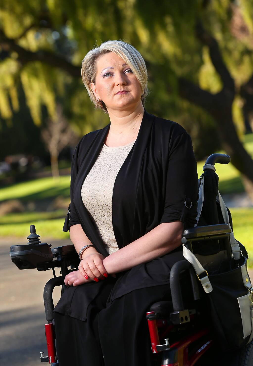 Inga Lizdenyte lost both her legs and the use of one arm at the age of 22 when she was in a car crash that killed her boyfriend. She is now a life coach, speaker and author.(Christopher Chung/ The Press Democrat)