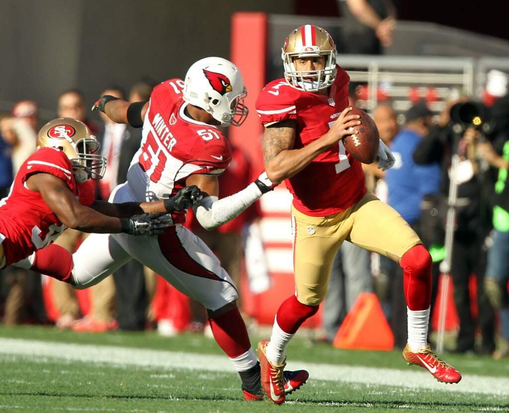 Colin Kaepernick, shown here running against the Arizona Cardinals last October, was 2-6 as a starter last season. After being the backup for the first five games this season, he returns to starting duties Sunday. (John Burgess / The Press Democrat)