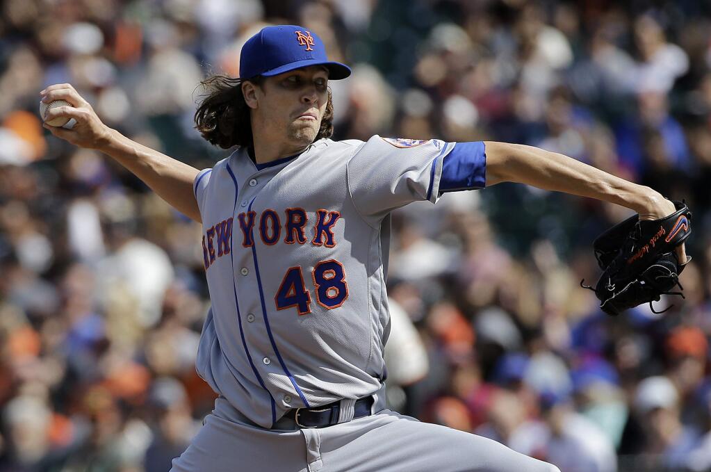 New York Mets pitcher Jacob deGrom (48) throws against the San Francisco Giants during the first inning of a baseball game in San Francisco, Saturday, June 24, 2017. (AP Photo/Jeff Chiu)
