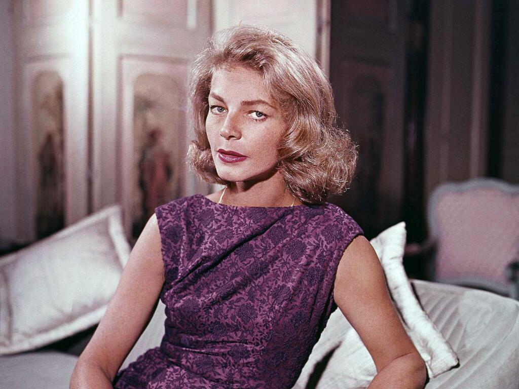 This 1965 file photo shows actress Lauren Bacall at her home in New York. Bacall, the sultry-voiced actress and Humphrey Bogart's partner off and on the screen, died Tuesday, Aug. 12, 2014 in New York. She was 89. (AP Photo, File)