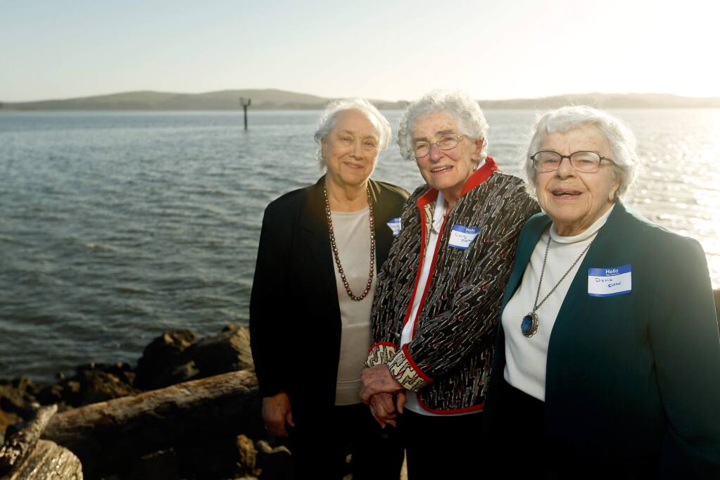 From left, Gaye LeBaron, Lucy Kortum and Doris Sloan pose for a portrait with Bodega Head behind them, in Bodega Bay, California, on Wednesday, May 2, 2018. The three women are being honored by the California Coastal Trail Association for their historic roles in the conservation of the North Coast. (Alvin Jornada / The Press Democrat)