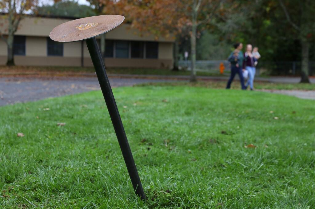 Someone has placed a large nail with the word 'bait' inscribed on it, at the location of the missing Hammer, by Doug Unkrey, at the Healdsburg Community Center, in Healdsburg on Monday, October 22, 2018. (Christopher Chung/ The Press Democrat)