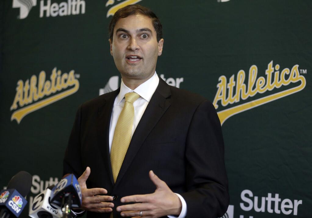 In this Nov. 17, 2016, file photo, Oakland Athletics President Dave Kaval gestures during a news conference in Oakland. (AP Photo/Ben Margot, File)