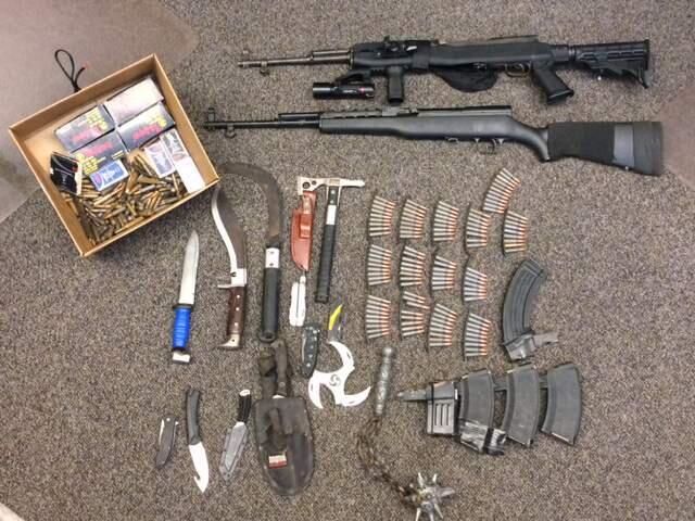 A Sebastopol man suspected of attempted burglary had 12 knives, two semi-automatic rifles, a medieval mace, a ninja throwing star and a significant amount of ammunition. (Photo: Cotati Police Department)