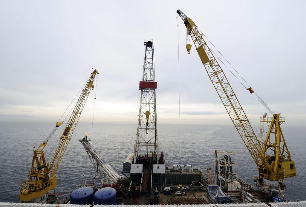 FILE - In this May 1, 2009 file photo, offshore oil drilling platform 'Gail' operated by Venoco, Inc., is shown off the coast of Santa Barbara, Calif. (AP Photo/Chris Carlson, file)