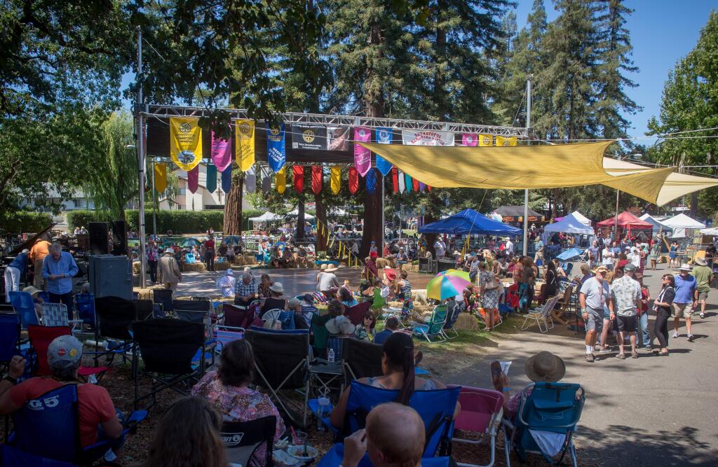 Crowds gather during the Sonoma County Cajun Zydeco and Delta Rhythm Festival in Sebastopol, Calif. Sunday, September 4, 2016. The festival is now in its 21st year. Guests were treated to food and live music. (Jeremy Portje / For The Press Democrat)