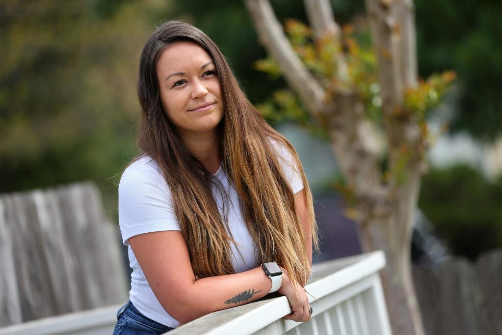 Brandi Caulfield, 23, a junior at Sonoma State University, lost her part-time job at Superburger and intern position with the City of San Rafael due to the coronavirus-induced economic shutdown.(Christopher Chung/ The Press Democrat)