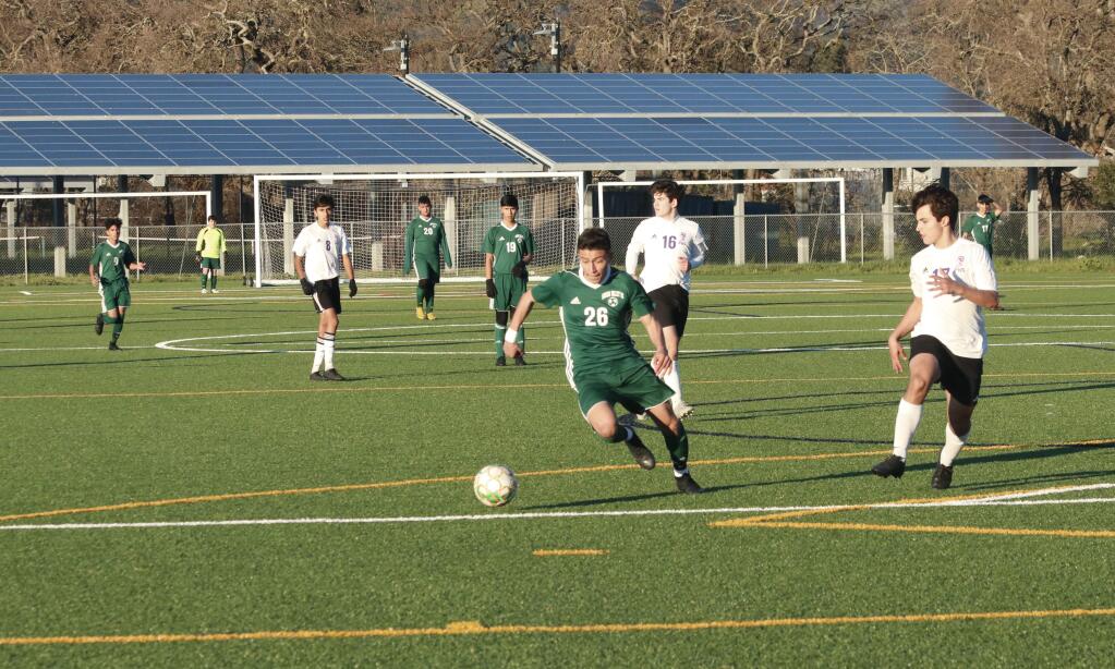 Sonoma Valley's Luis Pamat, a sophomore, drives the ball downfield in the Tueday, Feb. 5, game at Adele Harrison Middle School. The Dragons' won the game, 4-1. (Christian Kallen / Index-Tribune)