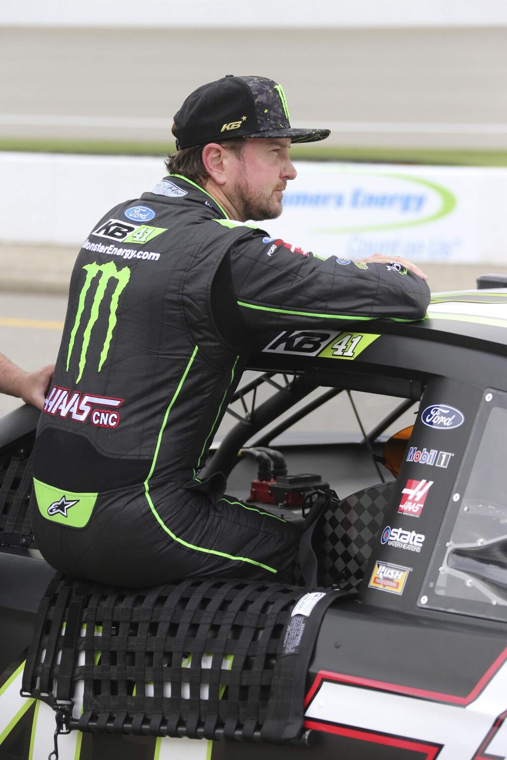 Kurt Busch watches the track to see if his qualifying will win the pole for Sunday's NASCAR Cup Series auto race in Brooklyn, Mich., Friday, June 8, 2018. Busch won the pole. (AP Photo/Bob Brodbeck)