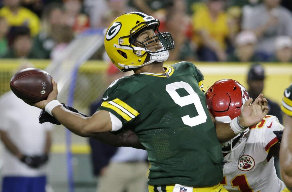 The Green Bay Packers' DeShone Kizer throws during the second half of a preseason game against the Kansas City Chiefs Thursday, Aug. 29, 2019, in Green Bay, Wisconsin. (AP Photo/Mike Roemer)