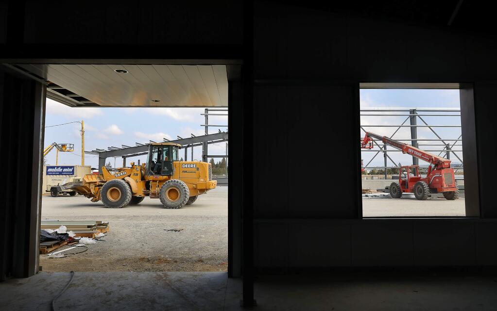 Construction continues on the first two, of five planned buildings, at Billa Landing industrial park, along Laughlin Road in Santa Rosa on Thursday, August 30, 2018. (Christopher Chung/ The Press Democrat)