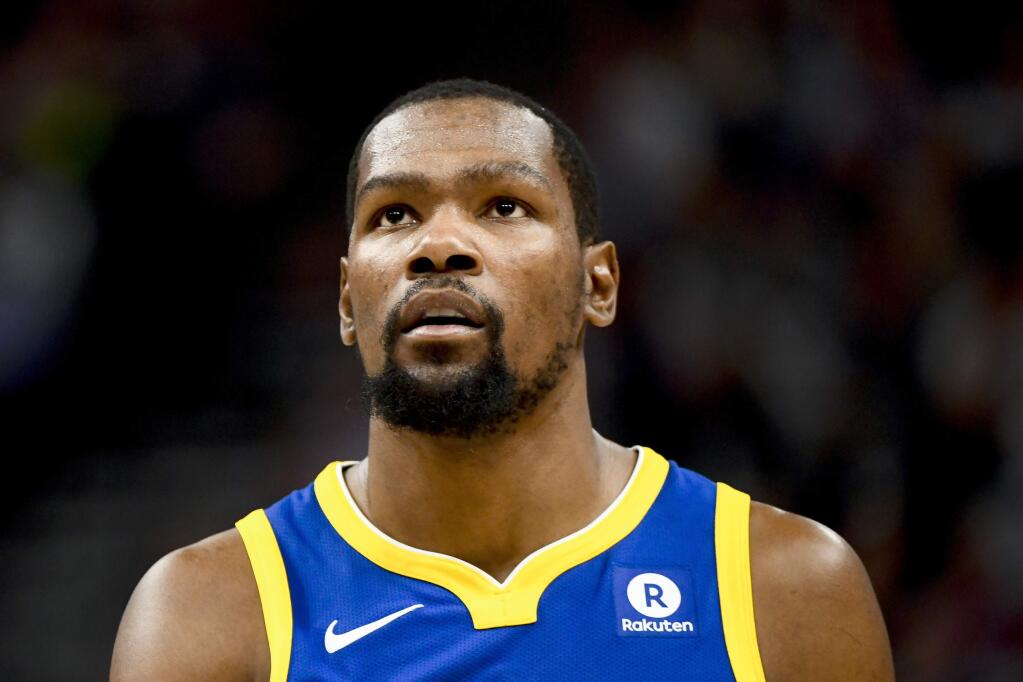 Golden State Warriors forward Kevin Durant looks on in the second half against the Utah Jazz Tuesday, April 10, 2018, in Salt Lake City. (AP Photo/Alex Goodlett)
