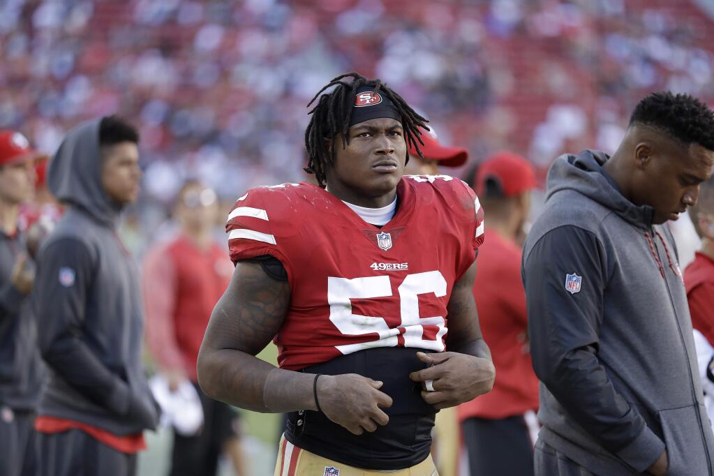 In this Oct. 22, 2017 file photo, San Francisco 49ers linebacker Reuben Foster stands on the sideline during the second half against the Dallas Cowboys in Santa Clara. (AP Photo/Marcio Jose Sanchez, File)
