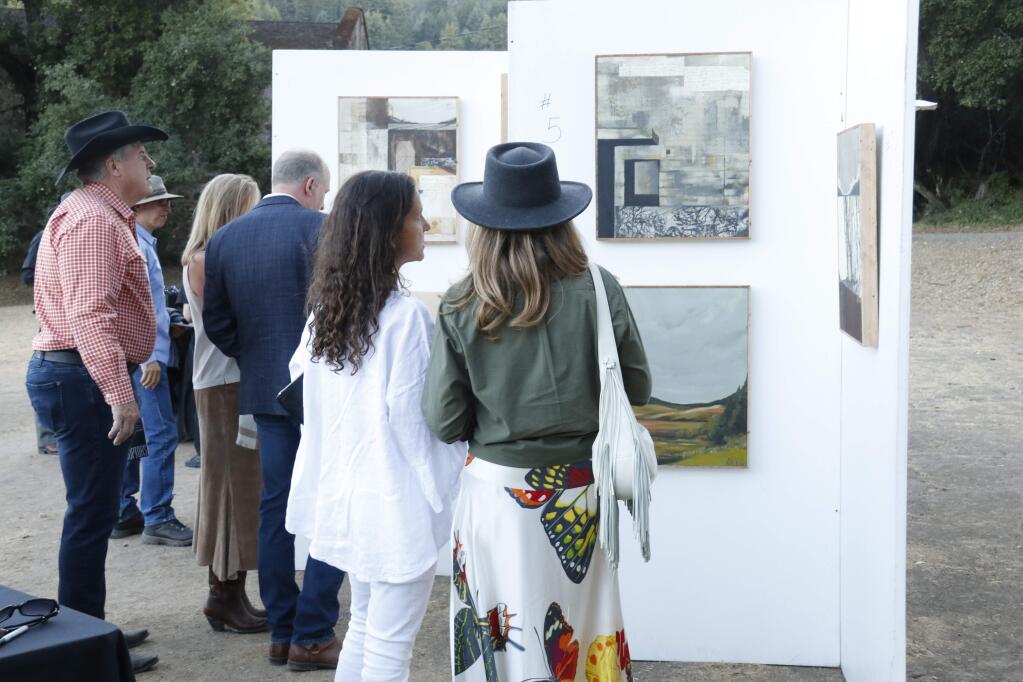 Viewing the artwork on sale at the Jack London State Park gala, Sept. 21, 2019. (Christian Kallen/Index-Tribune)