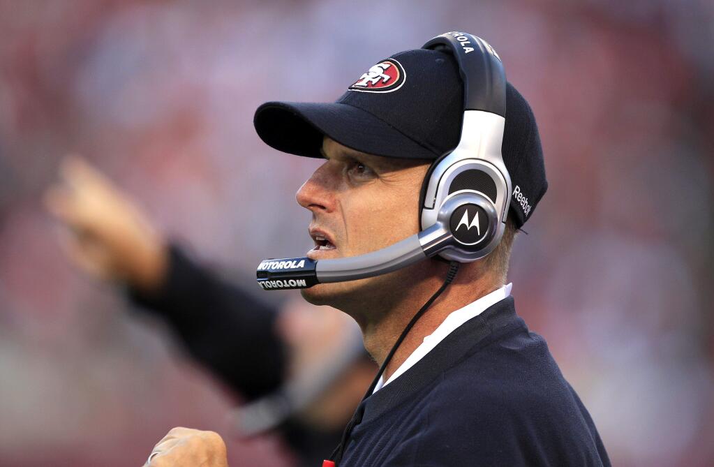 Jim Harbaugh's future has been the topic of much speculation in recent days. (Marcio Jose Sanchez / Associated Press)
