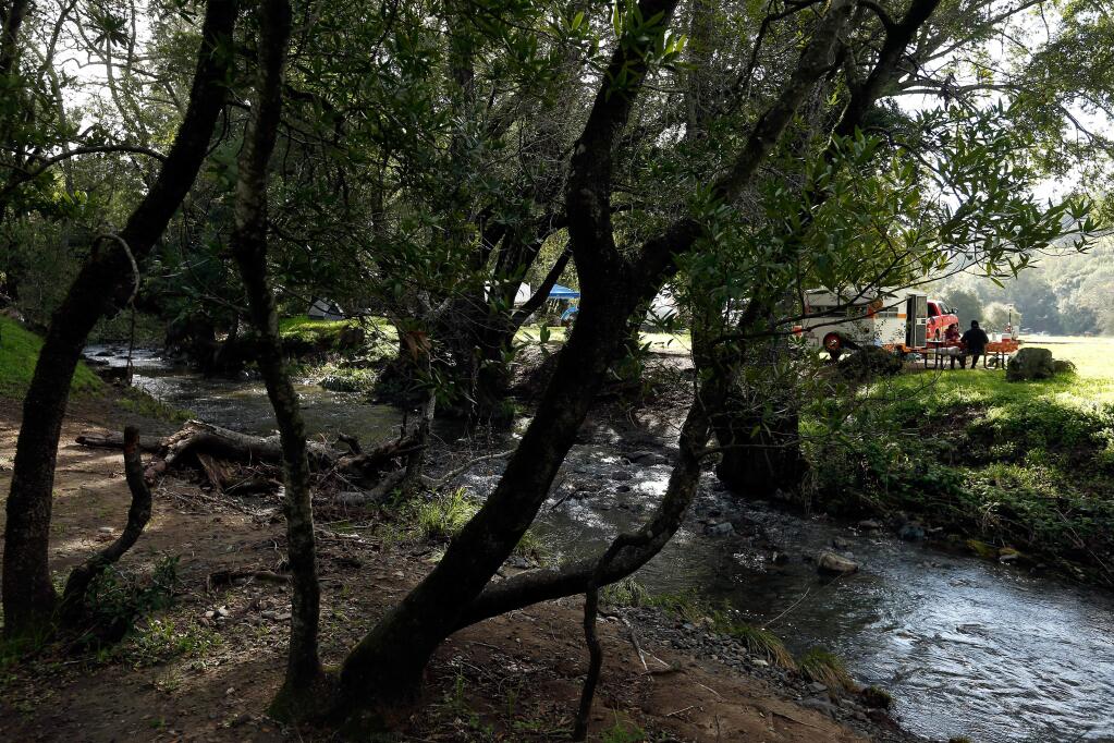 Campers have breakfast alongside Sonoma Creek at Sugarloaf Ridge State Park in Kenwood, California on Saturday, March 19, 2016. (Alvin Jornada / The Press Democrat)