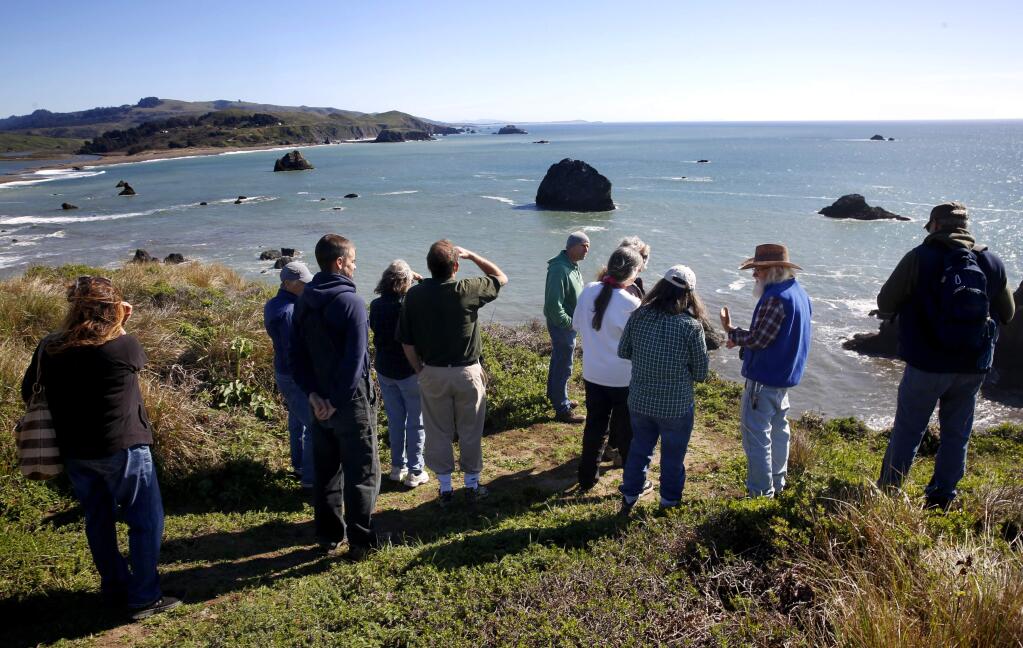 Experienced volunteers lead new volunteers on a Harbor Seal monitoring orientation with Stewards of the Coast and Redwoods in Jenner, California on Tuesday, February 24, 2015. (BETH SCHLANKER/ The Press Democrat)