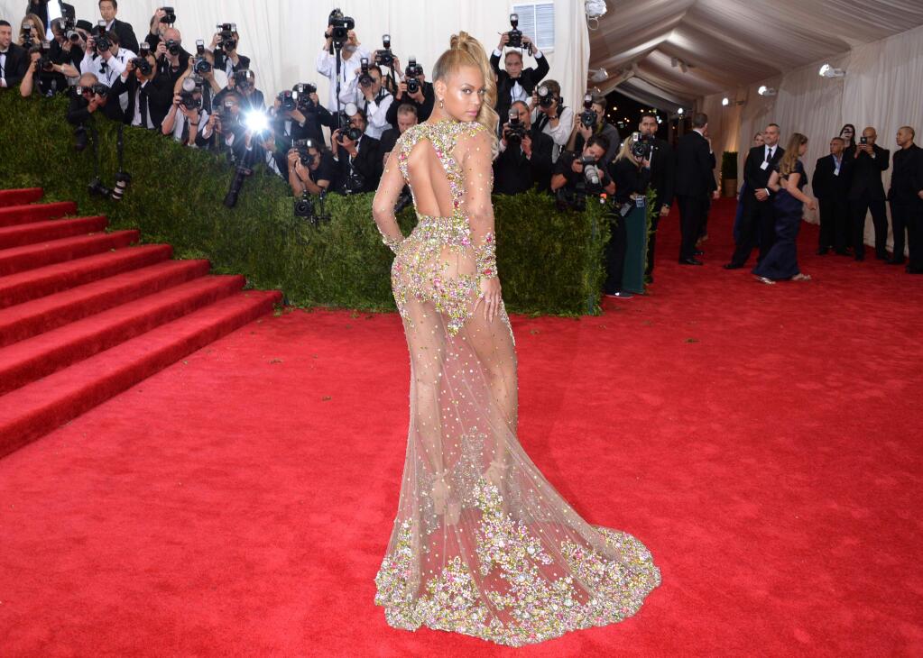 Beyonce arrives at The Metropolitan Museum of Art's Costume Institute benefit gala celebrating 'China: Through the Looking Glass' on Monday, May 4, 2015, in New York. (Photo by Evan Agostini/Invision/AP)
