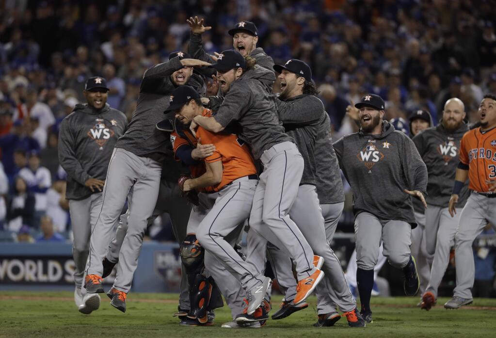 The Houston Astros celebrate after Game 7 of the World Series against the Los Angeles Dodgers Wednesday, Nov. 1, 2017, in Los Angeles. The Astros won 5-1 to win the series 4-3. (AP Photo/Matt Slocum)