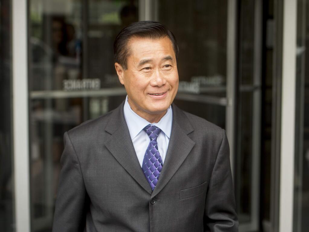 FILE - In this July 31, 2014 file photo, California state Sen. Leland Yee, D-San Francisco, leaves federal court in San Francisco. The former California state senator charged in a sweeping organized crime and public corruption case centered in San Francisco's Chinatown may have reached a plea deal with federal prosecutors. Yee, who previously has pleaded not guilty to bribery, money laundering and other felony charges, was scheduled to go on trial in late July along with three co-defendants. A judge has scheduled change-of-plea hearings for the four on Wednesday, July 1, 2015. (AP Photo/Noah Berger, File)