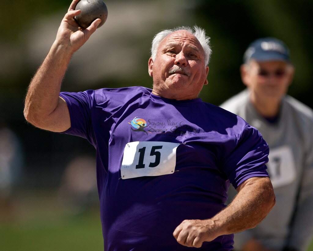George Patterson Sr. competes in the shot put during the 2013 Sonoma Wine Country Senior Games at Healdsburg High School. (Alvin Jornada / For The Press Democrat)