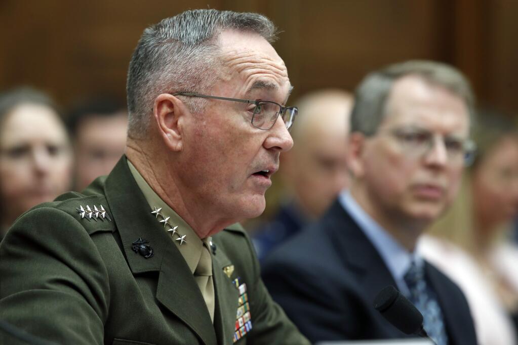 Joint Chiefs Chairman Gen. Joseph Dunford, left, and Under Secretary of Defense (Comptroller) and Chief Financial Officer David L. Norquist testify on the FY2019 budget during a hearing of the House Armed Services Committee on Capitol Hill, Thursday, April 12, 2018 in Washington. (AP Photo/Alex Brandon)