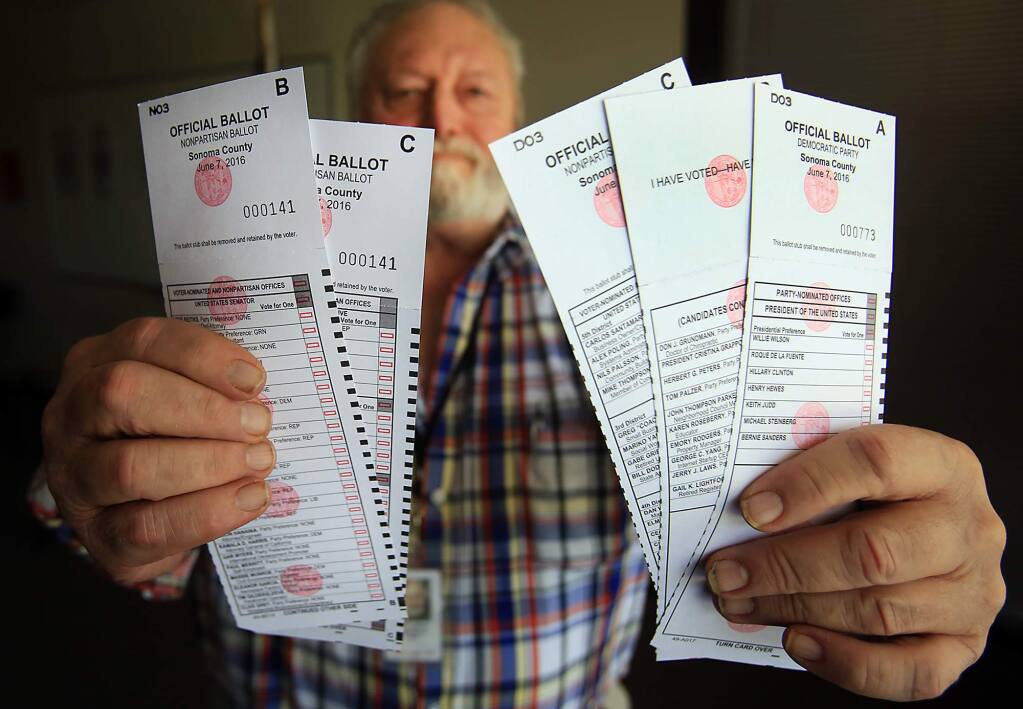 Scott Gaynos received two ballots in the mail, non-partisan, left and a Democrat, right, Monday May 31, 2016. (Kent Porter / Press Democrat) 2016
