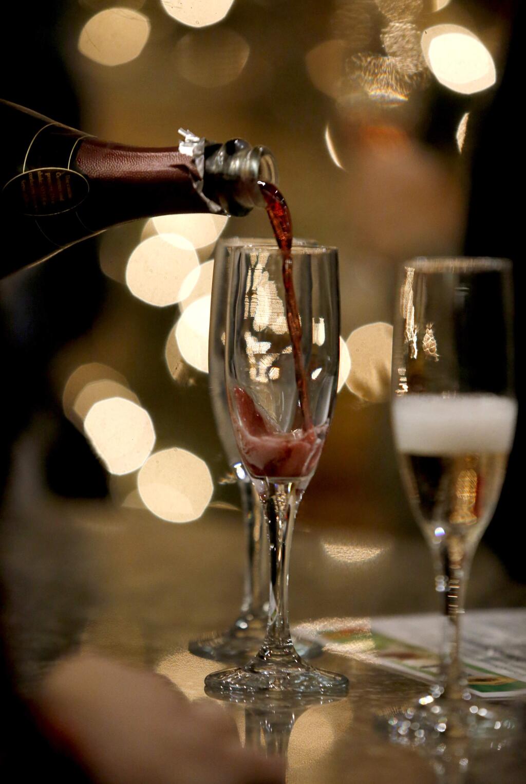 A glass of Korbel Rouge champagne is poured at Korbel Champagne Cellars in Guerneville, on Thursday, December 29, 2016. (BETH SCHLANKER/ The Press Democrat)