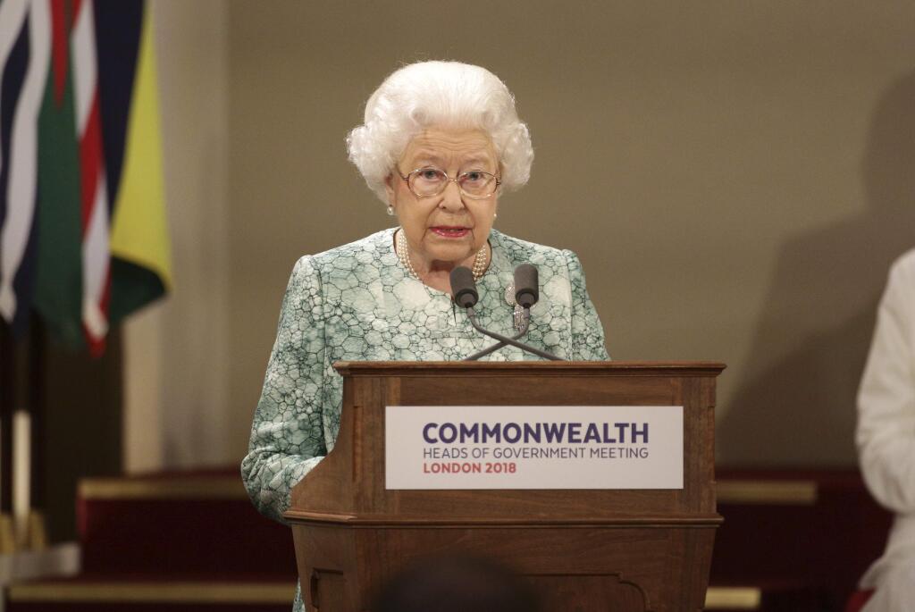 Britain's Queen Elizabeth II speaks during the formal opening of the Commonwealth Heads of Government Meeting in the ballroom at Buckingham Palace in London, Thursday April 19, 2018. (Yui Mok/Pool via AP)