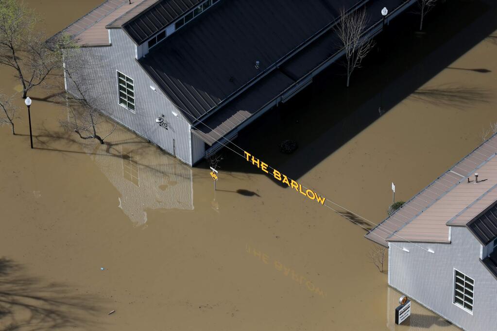 Floodwaters in The Barlow in Sebastopol on Thursday, February 28, 2019. (BETH SCHLANKER/ The Press Democrat)