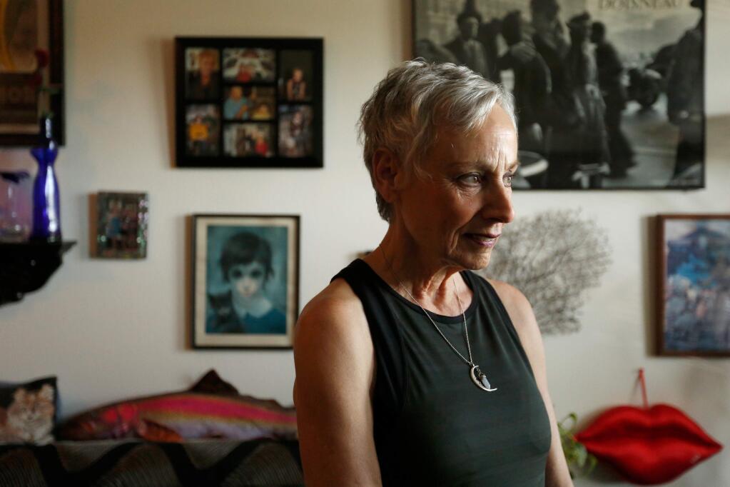 Gail Etzler, 67, poses for a portrait at her home in Santa Rosa, California on Wednesday, June 1, 2016. (Alvin Jornada / The Press Democrat)