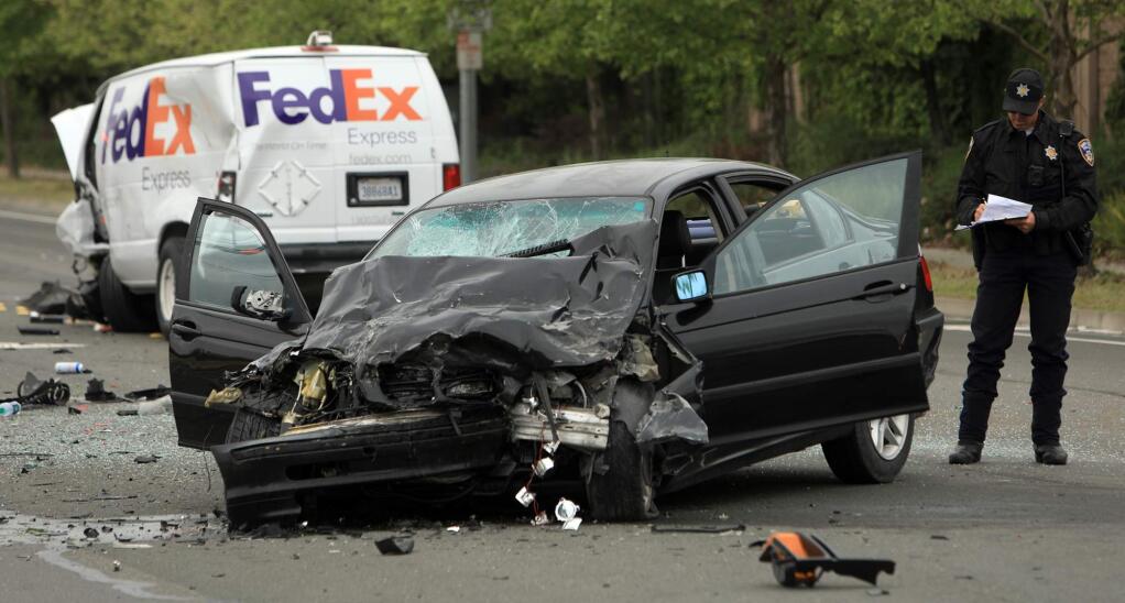 The drivers of a sedan and a Federal Express delivery van collided head on at the intersection of Tedeschi and Fulton Road in Santa Rosa, Tuesday, April 24, 2018 resulting in serious injuries, (Kent Porter / The Press Democrat) 2018