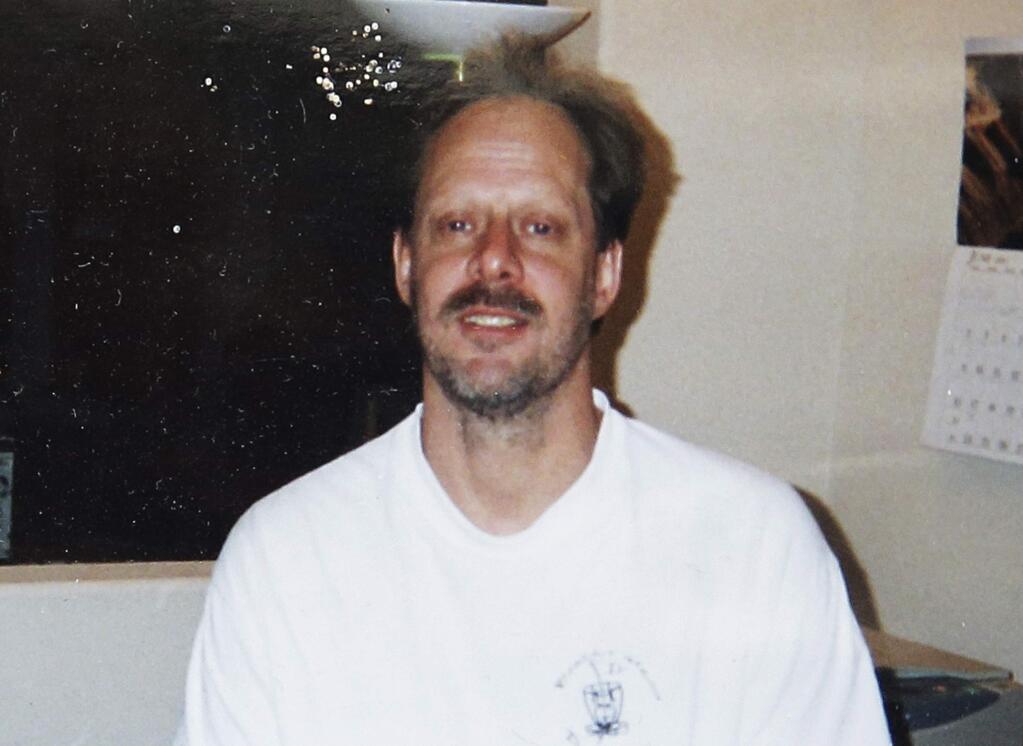 FILE - This undated file photo provided by Eric Paddock shows his brother, Las Vegas gunman Stephen Paddock. Police initially said Stephen Paddock stopped firing on the music festival concert crowd below to shoot through his door and wound a Mandalay Bay security guard who was outside. On Monday, Oct. 9, 2017, they said the guard actually was wounded before Paddock started the massacre. (Courtesy of Eric Paddock via AP, File)