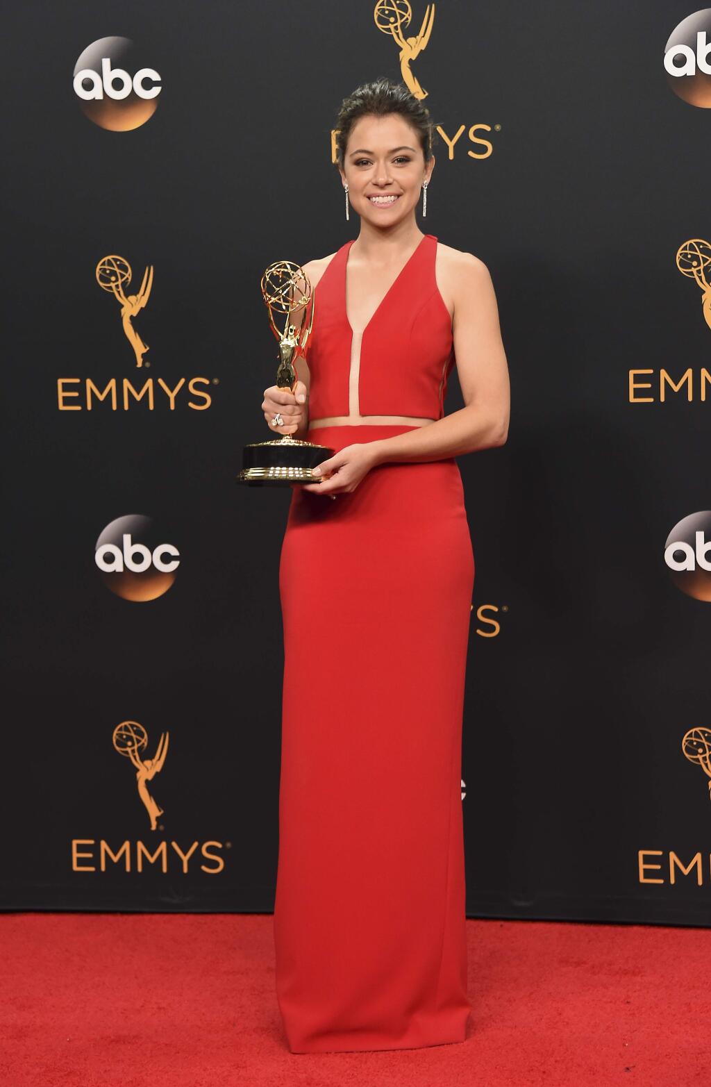 Tatiana Maslany winner of the award for outstanding lead actress in a drama series for Orphan Black poses in the press room at the 68th Primetime Emmy Awards on Sunday, Sept. 18, 2016, at the Microsoft Theater in Los Angeles. (Photo by Jordan Strauss/Invision/AP)
