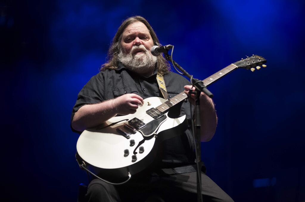 In this March 17, 2018 photo, Roky Erickson performs at the South by Southwest Music Festival in Austin, Texas. Erickson, the blue-eyed, dark-haired Texan who headed the Austin-based 13th Floor Elevators, a pioneering psychedelic rock band in the 1960s that scored with 'You're Gonna Miss Me,' has died, Friday, May 31, 2019. He was 71. (Jay Janner/Austin American-Statesman via AP)