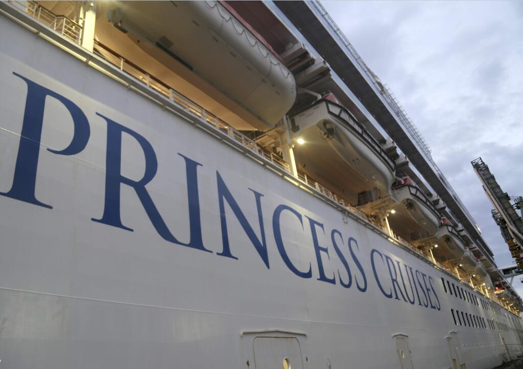 In this photo provided by the New South Wales Police, a Ruby Princess cruise ship is docked in Wollongong, Australia, Wednesday, April 8, 2020. (Nathan Patterson / NSW Police via AP)